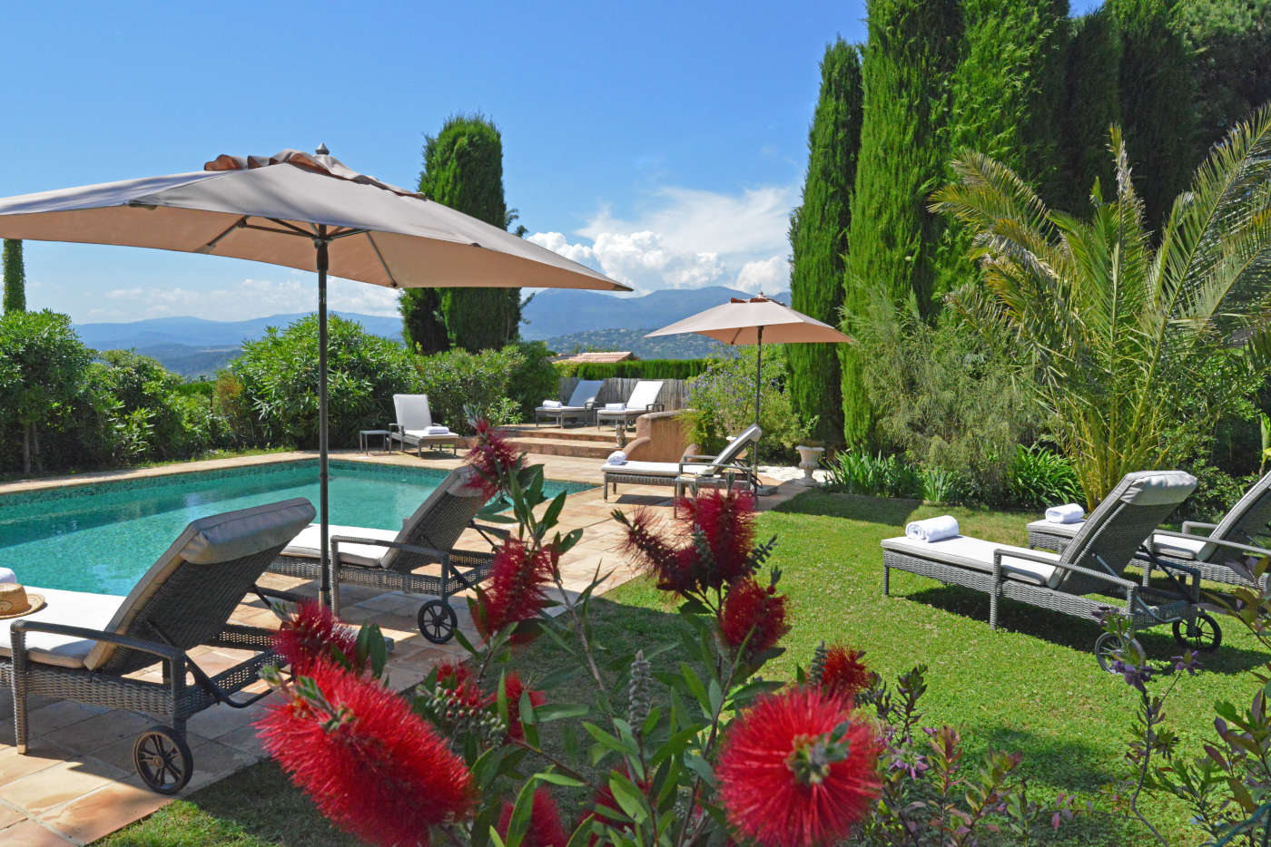 The flowered area around the pool